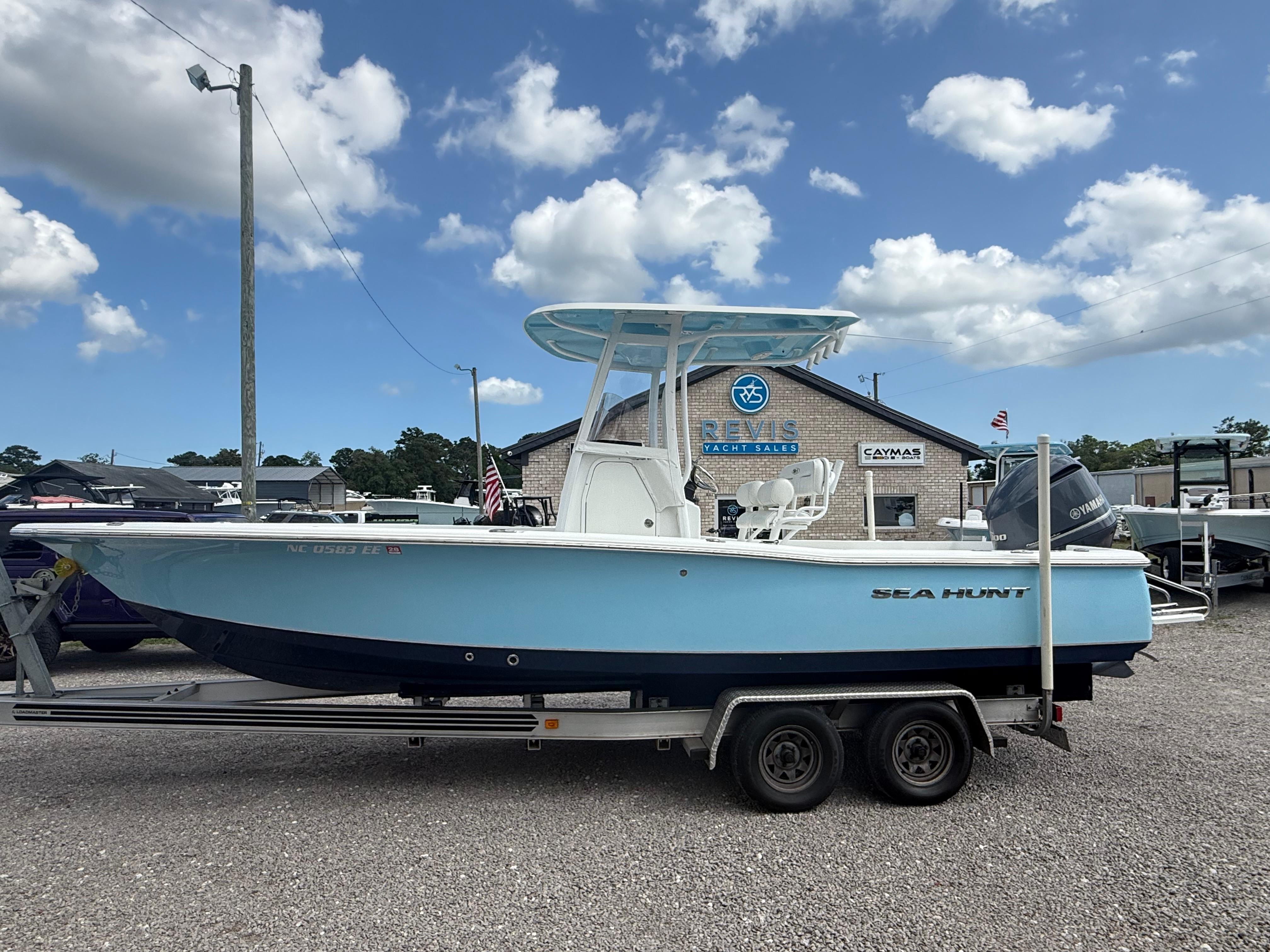 Slide: The Image of 2016 Sea Hunt BX 24 BR boat on trailer at yacht sales lot. - 32