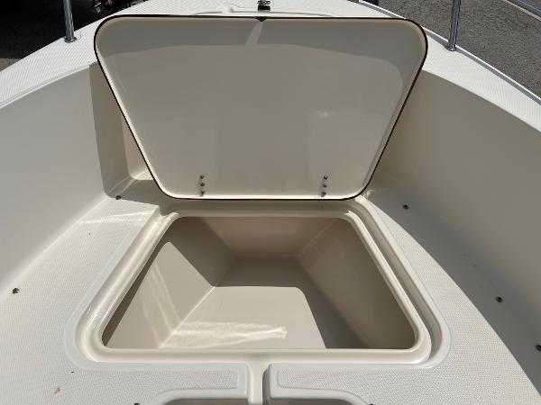 Slide: The Image of Open storage compartment on 2000 Sea Hunt Escape 200 boat. - 18