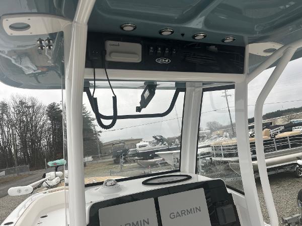 Slide: The Image of 2022 Sea Hunt Escape 27 boat interior with Garmin navigation system. - 7