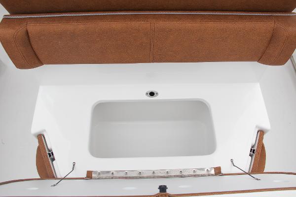Slide: The Image of 2024 Sea Hunt Ultra 234 boat seating and storage compartment. - 22