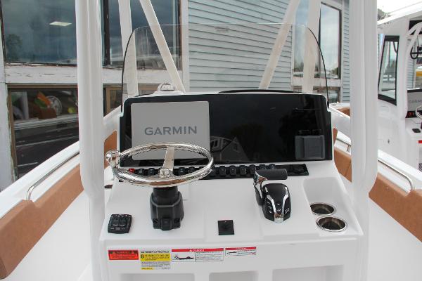 Slide: The Image of 2024 Sea Hunt Ultra 234 boat console with Garmin navigation system. - 35