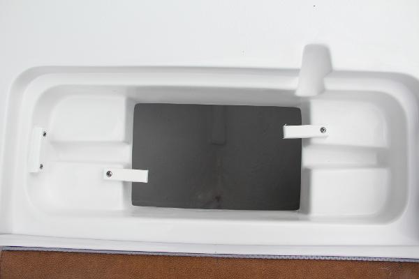Slide: The Image of 2024 Sea Hunt Ultra 234 storage compartment. - 50