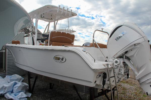 Slide: The Image of 2024 Sea Hunt Ultra 234 boat with Yamaha outboard motor. - 6