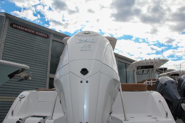 Slide: The Image of 2024 Sea Hunt Ultra 234 boat at Harborside Marina. - 8