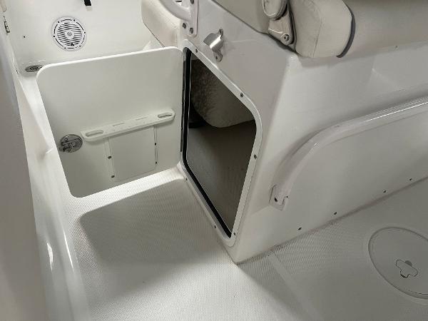 Slide: The Image of 2024 Sea Hunt Ultra 239 SE boat interior storage compartment. - 15