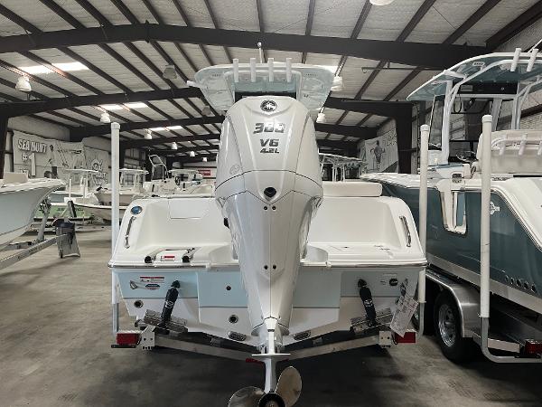Slide: The Image of 2024 Sea Hunt Ultra 239 SE boat in showroom, rear view. - 3
