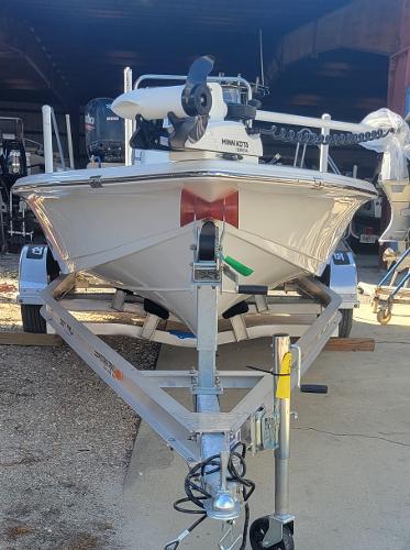 Slide: The Image of 2024 Sea Pro 172 Bay boat on trailer in storage facility. - 1