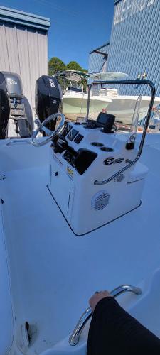 Slide: The Image of 2024 Sea Pro 172 Bay boat console with steering wheel and controls. - 11