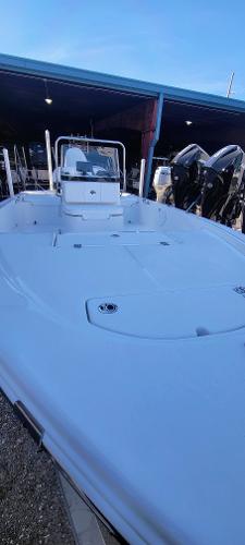 Slide: The Image of 2024 Sea Pro 172 Bay boat with center console in a marina. - 17