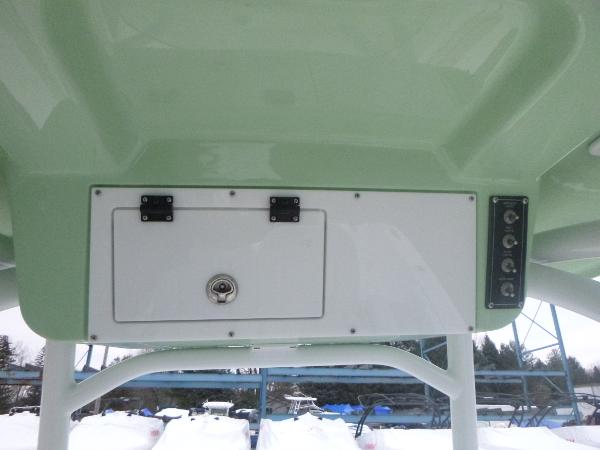 Slide: The Image of 2024 Sea Pro 222 Center Console boat overhead storage compartment. - 18