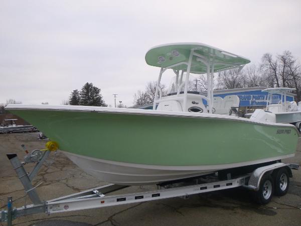 Slide: The Image of 2024 Sea Pro 222 Center Console boat on a trailer. - 2