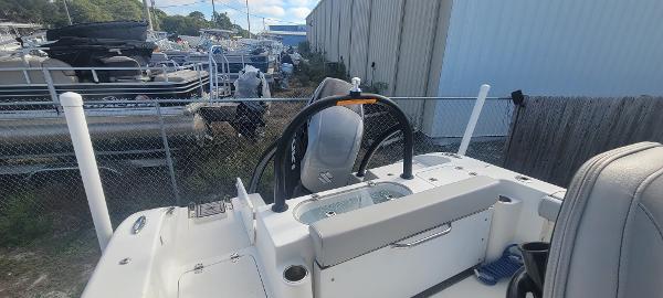 Slide: The Image of 2020 Sea Pro 239CC boat in a marina storage area. - 13