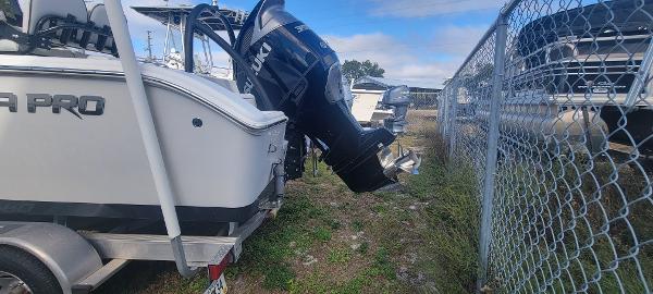 Slide: The Image of 2020 Sea Pro 239CC boat on trailer with outboard motor. - 2