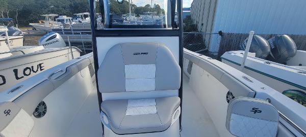 Slide: The Image of 2020 Sea Pro 239CC boat interior with cushioned seating and console. - 27