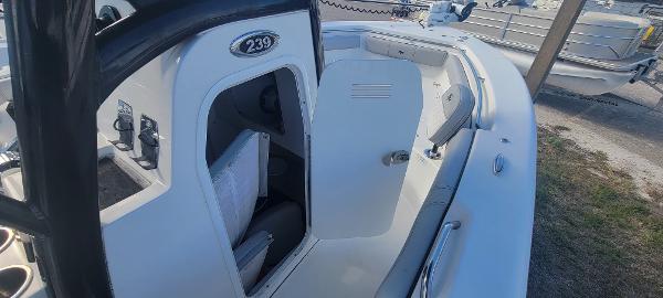 Slide: The Image of 2020 Sea Pro 239CC boat interior with open cabin door. - 29
