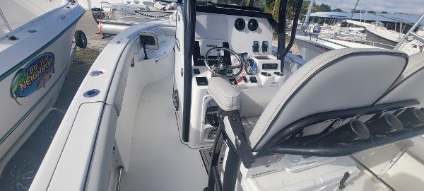 Slide: The Image of 2020 Sea Pro 239CC center console boat interior with helm and seating. - 32