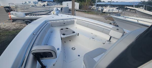 Slide: The Image of 2020 Sea Pro 239CC boat interior with seating and table. - 35