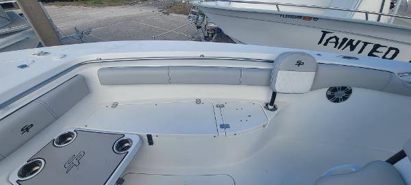 Slide: The Image of 2020 Sea Pro 239CC boat interior with seating and cup holders. - 37