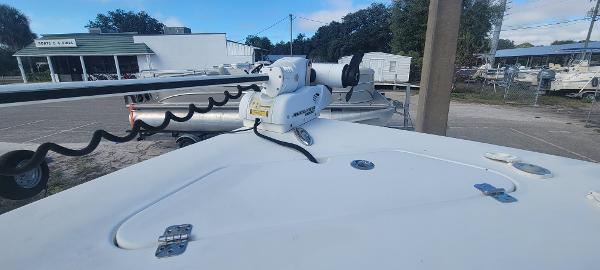 Slide: The Image of 2020 Sea Pro 239CC boat with trolling motor in a marina. - 38