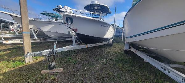 Slide: The Image of 2020 Sea Pro 239CC boat on a trailer in a storage yard. - 5