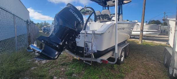 Slide: The Image of 2020 Sea Pro 239CC boat with Suzuki outboard motor on trailer. - 9