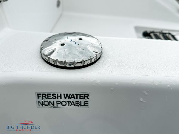 Slide: The Image of 2023 Sea Pro 239 DLX boat, non-potable fresh water cap. - 12