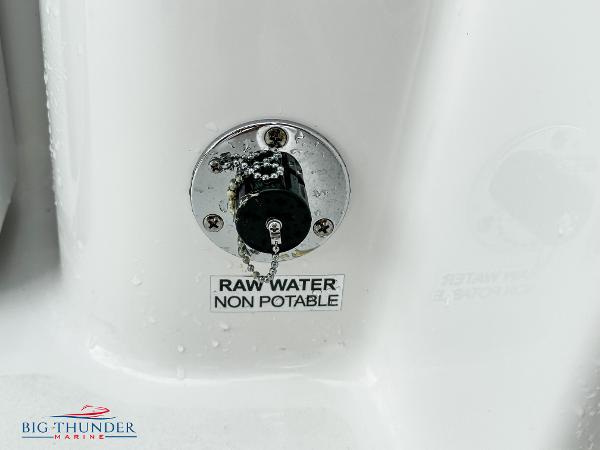 Slide: The Image of Raw water non-potable outlet on 2023 Sea Pro 239 DLX boat. - 16