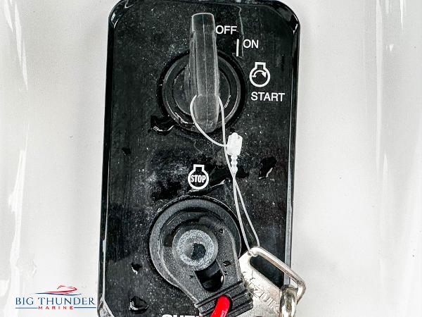 Slide: The Image of 2023 Sea Pro 239 DLX ignition switch with key and safety lanyard. - 33