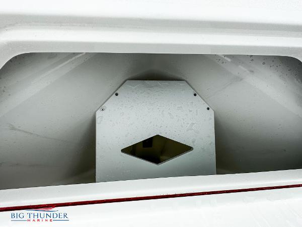Slide: The Image of 2023 Sea Pro 239 DLX boat compartment with Big Thunder Marine logo. - 49