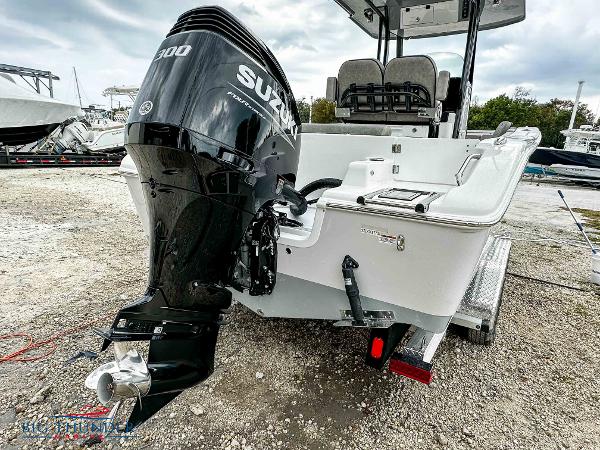 Slide: The Image of 2023 Sea Pro 239 DLX boat with Suzuki 300 outboard motor. - 7