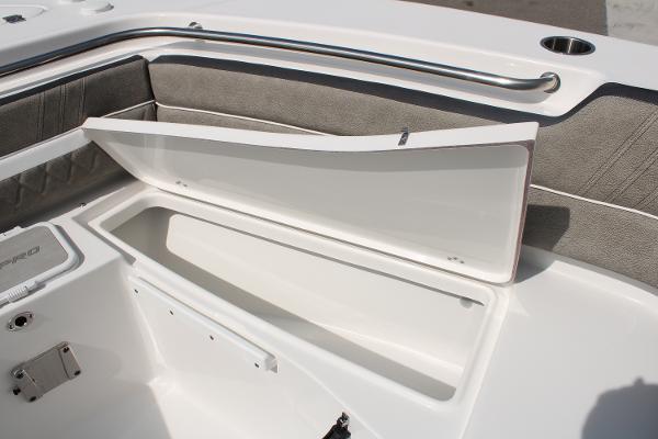 Slide: The Image of 2024 Sea Pro 240 boat storage compartment with open lid. - 13