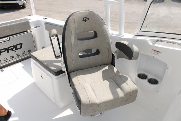 Slide: The Image of 2024 Sea Pro 240 boat captain's chair and seating area. - 18