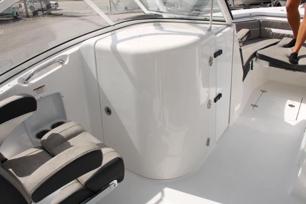 Slide: The Image of Interior of 2024 Sea Pro 240 boat with seating and storage compartments. - 20