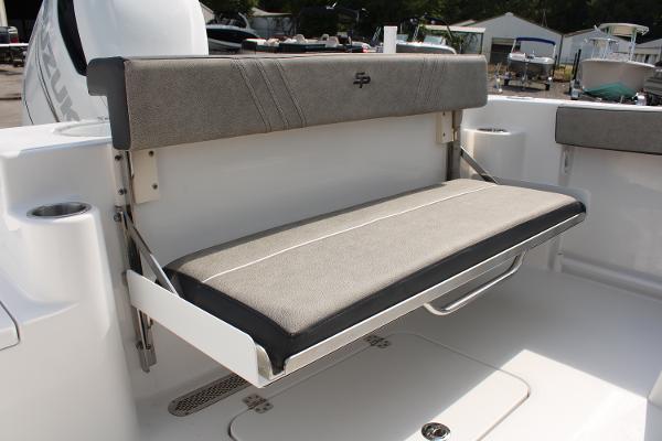 Slide: The Image of 2024 Sea Pro 240 boat with foldable rear bench seat in gray upholstery. - 23
