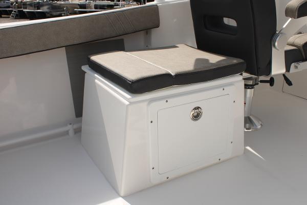 Slide: The Image of 2024 Sea Pro 240 boat seating and storage compartment. - 24