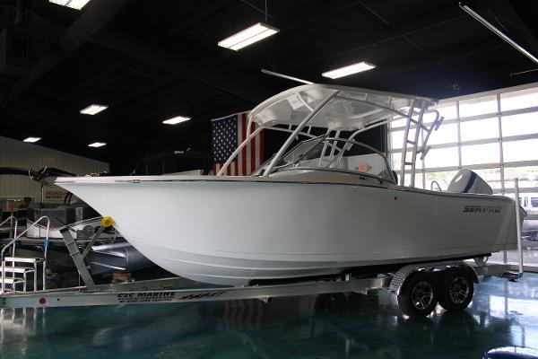 Slide: The Image of 2024 Sea Pro 240 boat on a trailer in a showroom. - 3