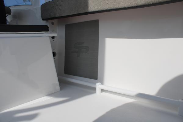 Slide: The Image of 2024 Sea Pro 240 boat interior with seating and logo. - 30