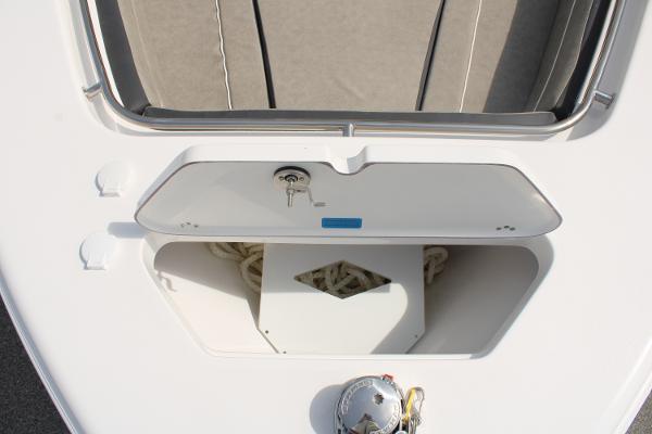 Slide: The Image of 2024 Sea Pro 240 boat anchor storage compartment with rope. - 5