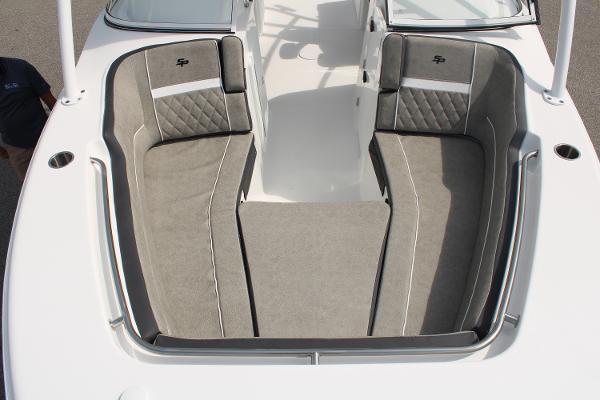 Slide: The Image of 2024 Sea Pro 240 boat interior with cushioned seating and modern design. - 6