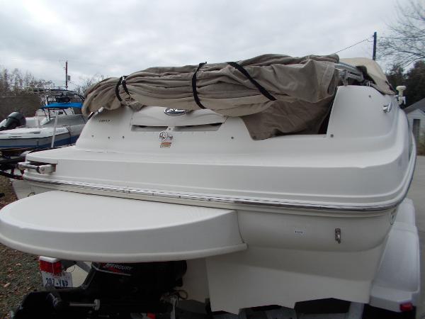 Slide: The Image of 2001 Sea Ray 190 Sundeck boat rear view with cover. - 3