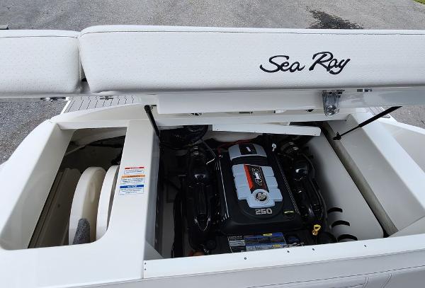 Slide: The Image of 2024 Sea Ray 230 SPX boat engine compartment with open hatch. - 9