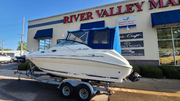 Slide: The Image of 1996 Sea Ray 240 Sundancer boat on trailer at River Valley Marine. - 2