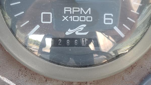 Slide: The Image of Close-up of 1996 Sea Ray 240 Sundancer RPM gauge showing 2861 hours. - 22
