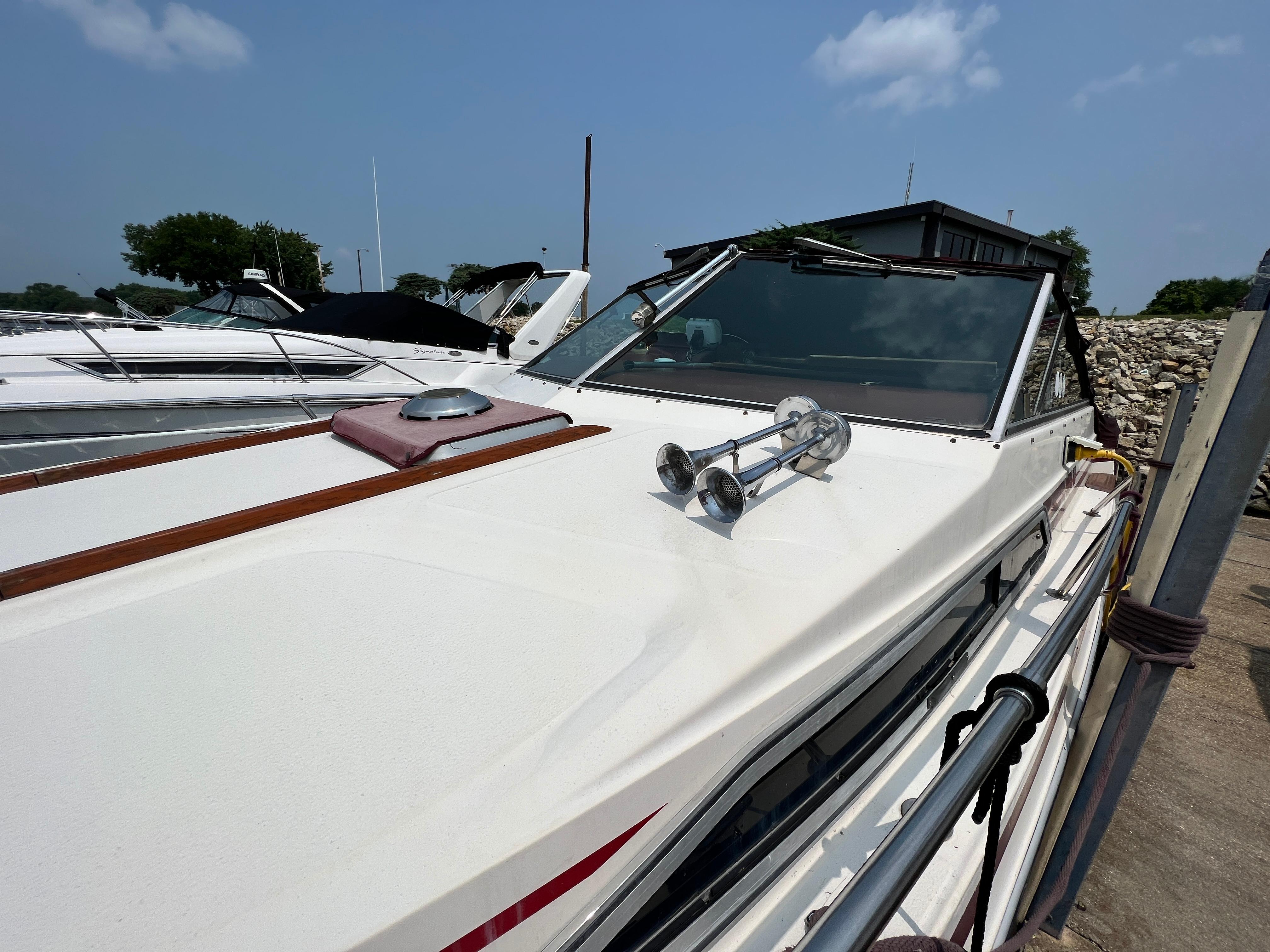 Slide: The Image of Sea Ray 245 Sundancer 1984 - 1