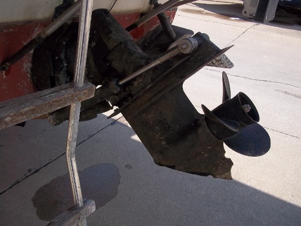 Slide: The Image of 1984 Sea Ray SRV 260 Sundancer boat propeller and outdrive on dry dock. - 24