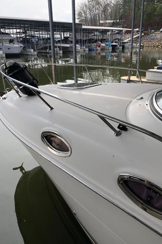 Slide: The Image of 2007 Sea Ray 260 Sundancer docked at a marina. - 1