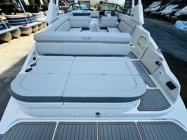 Slide: The Image of 2025 Sea Ray 270 SDX boat interior with spacious seating and modern design. - 11