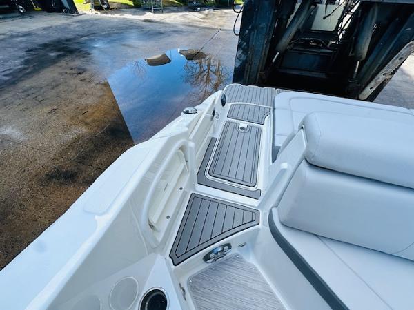 Slide: The Image of 2025 Sea Ray 270 SDX boat interior with sleek seating and deck design. - 13