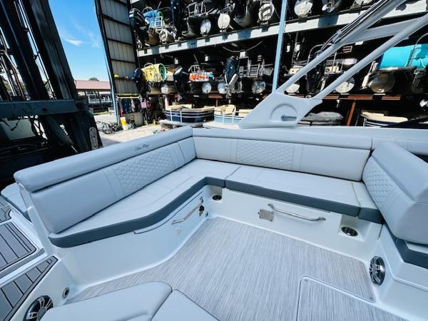 Slide: The Image of 2025 Sea Ray 270 SDX boat interior with spacious seating and modern design. - 15