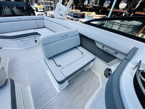 Slide: The Image of 2025 Sea Ray 270 SDX boat interior with luxurious seating and modern design. - 19